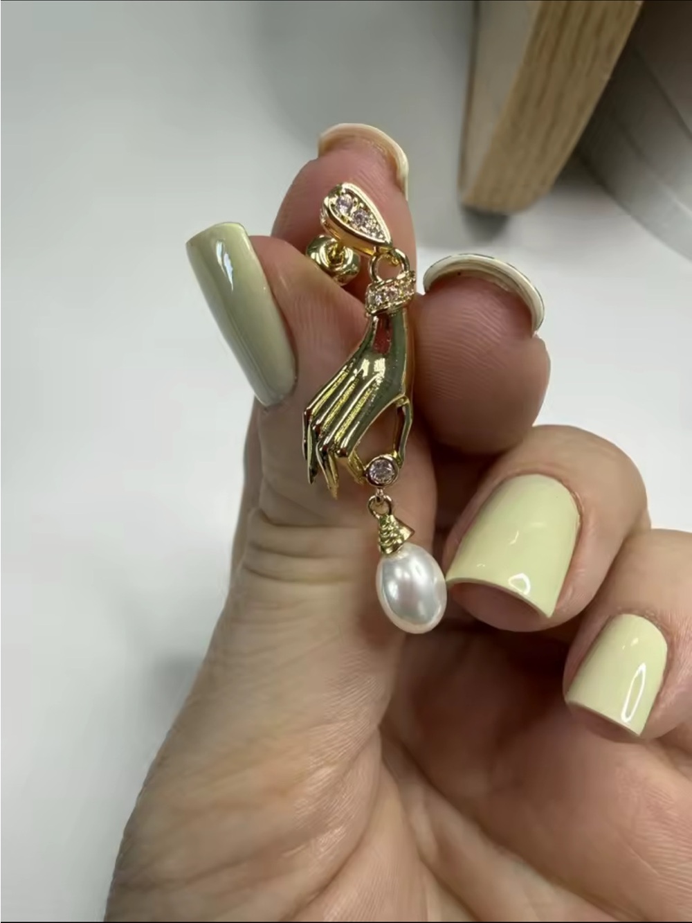 Elegant Unique Gold Hand Earrings with Pearls